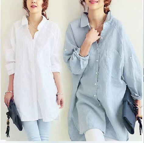 Women's oversized button-up tunic top, perfect for casual wear and everyday style.
