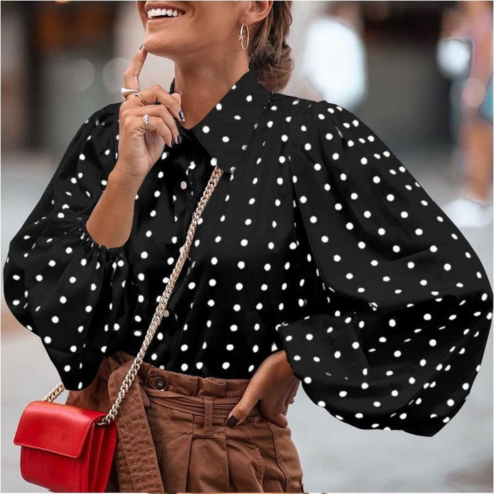 Elegant women's polka dot puff sleeve blouse, perfect for chic casual wear or stylish outfits. Versatile top.