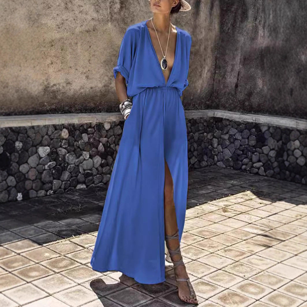 Flowy high-slit maxi dress, ideal for women's summer parties or beach wear. Deep V-neck design.