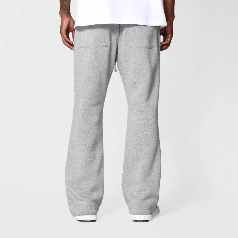 Men's flared sweatpants offering ultimate comfort, a relaxed fit, and modern casual style for everyday wear.