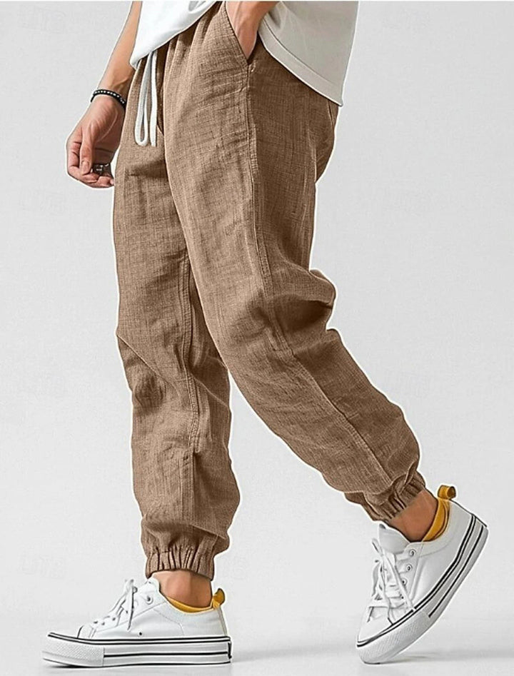 Comfortable men's lounge pants, perfect for travel or everyday wear. Features side pockets.