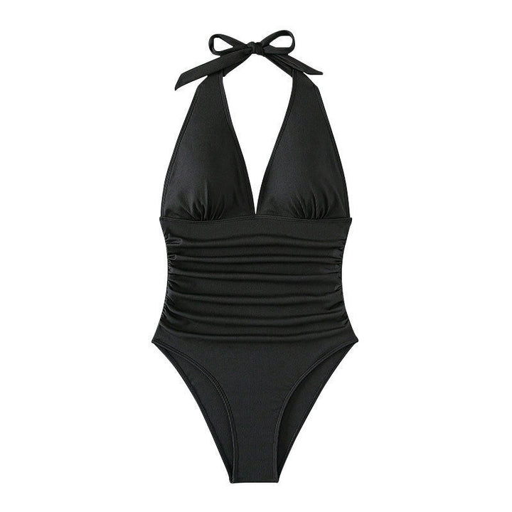 Modern women's one-piece swimsuit with stylish plunge V-neck, ideal for contemporary summer beachwear.
