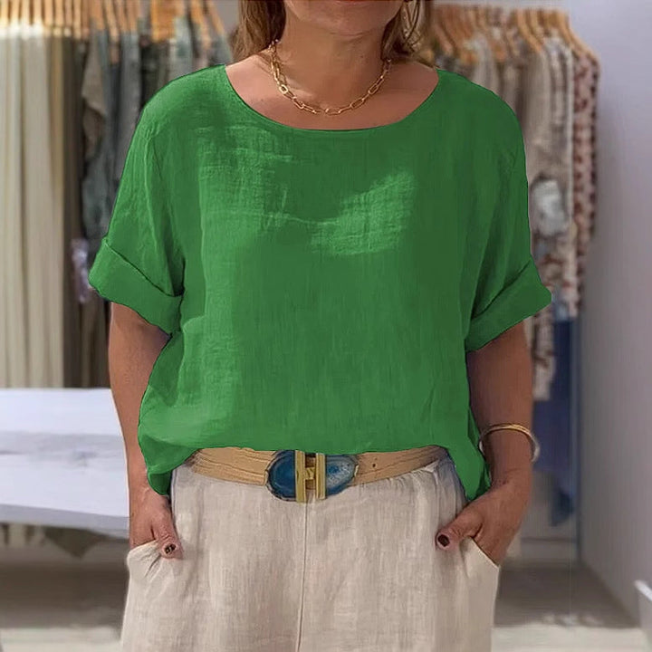 Comfortable women's relaxed fit blouse, rolled sleeves, ideal for versatile spring & summer wear.