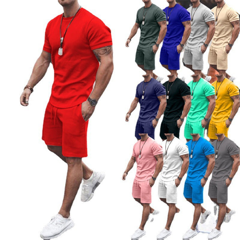 Men's summer sportswear set: breathable tee & shorts for active days.
