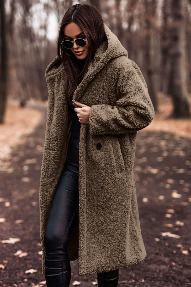 Elegant women's hooded plush longline jacket, perfect for stylish winter layering.