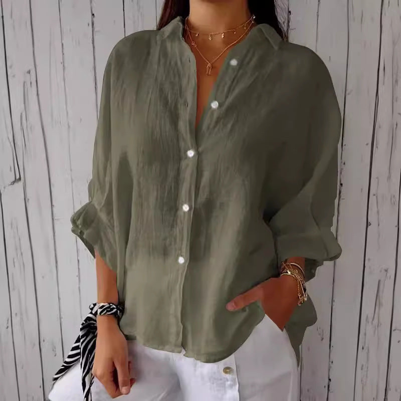 Stylish loose fit women's top, great for a relaxed yet polished summer outfit.