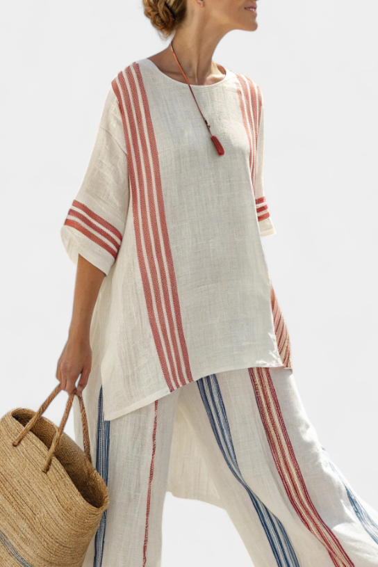 Comfortable women's striped top & flowy wide-leg pants set. Multicolor stripes, ideal for casual summer fashion.
