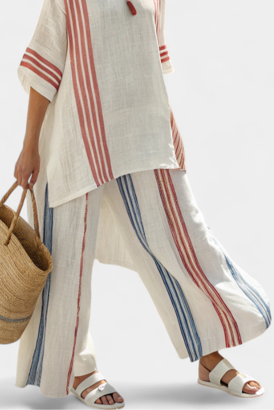 Elegant women's striped top and flowy pants two-piece set. Great for resort style, summer outings, or vacation.