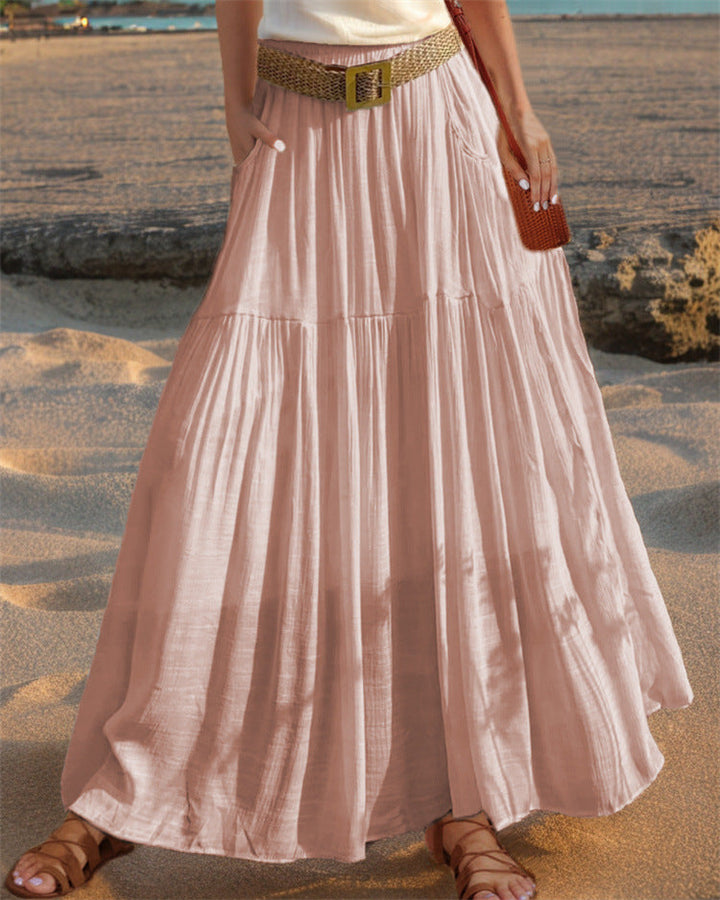 Pleated women's long skirt with pockets, a stylish and practical addition to any wardrobe.