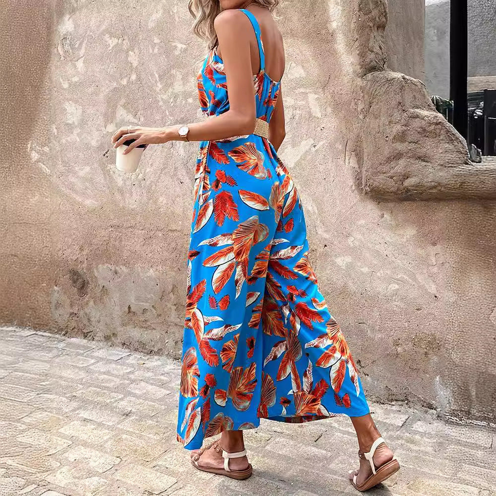 Casual women's tropical print maxi jumpsuit with wide-leg & strappy design, ideal for summer beach wear.