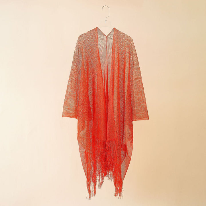 Elegant women's summer fringe kimono, flowy design, ideal beach cover-up.