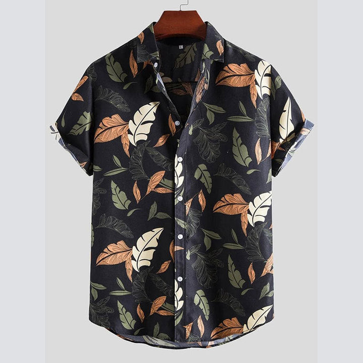 Men's short-sleeve casual shirt with vibrant floral print, perfect for summer fashion and vacation wear.