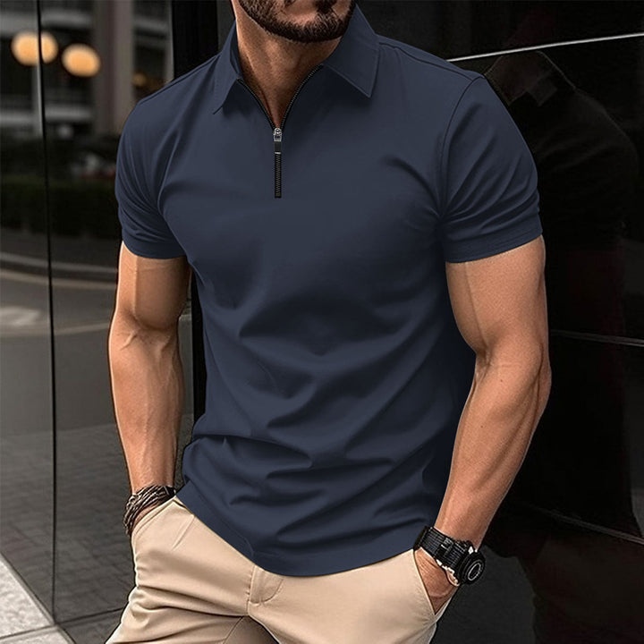 Men's zip polo styled casually, modern activewear look, comfortable short sleeve design.