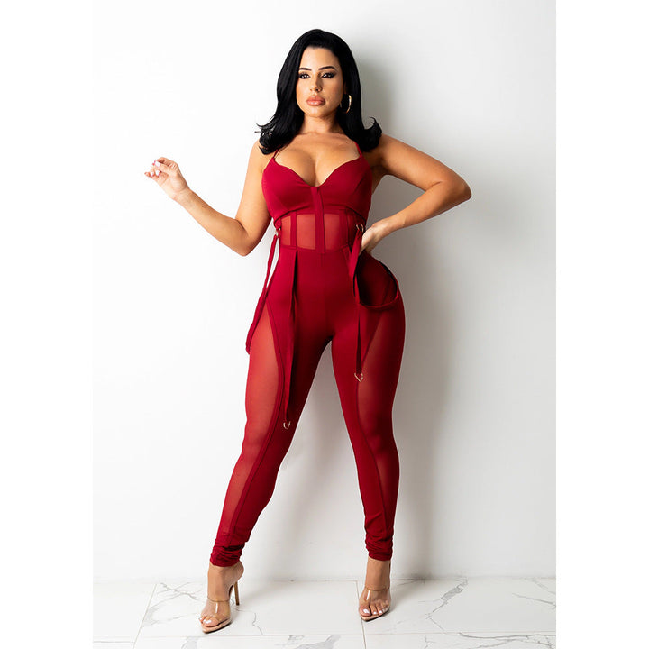 Elegant women's statement jumpsuit featuring transparent panels, perfect for chic parties.