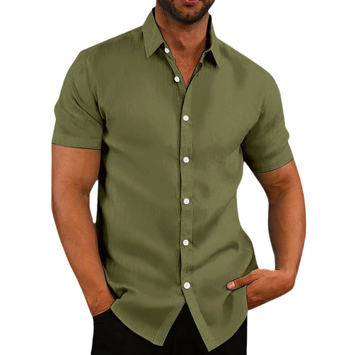 Man models comfortable short sleeve button placket leisure shirt, ideal for relaxed summer days.