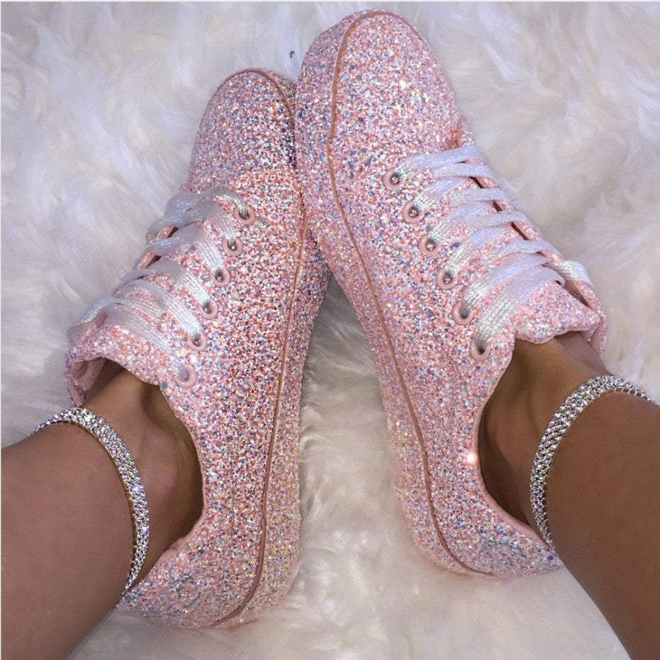 Women's sparkling fashion sneakers with dazzling glitter details & comfortable breathable sole for stylish everyday wear.