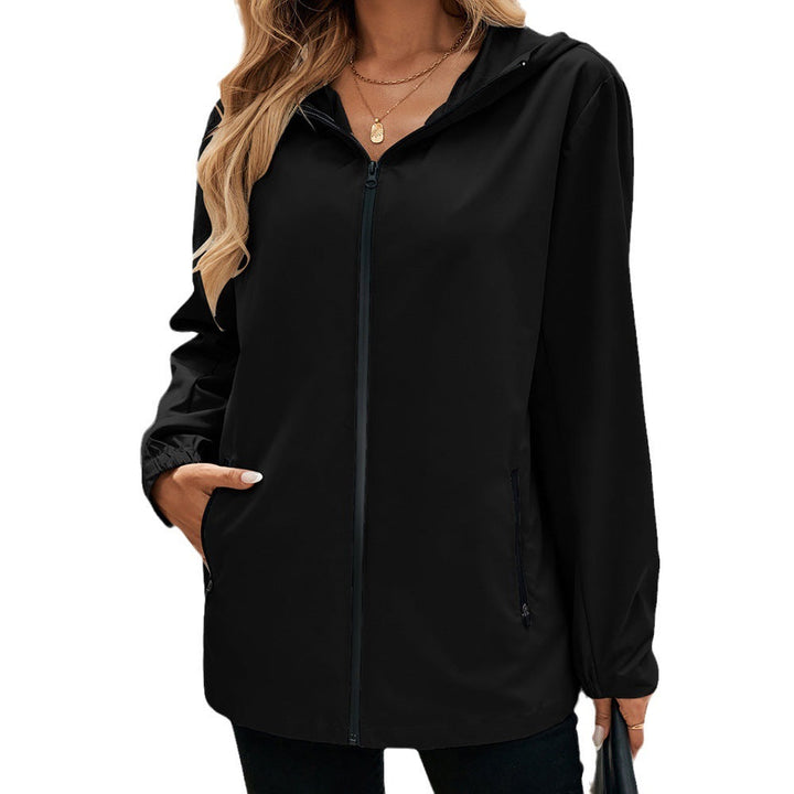 Comfortable women's lightweight hooded jacket with pockets, excellent for transitional weather.