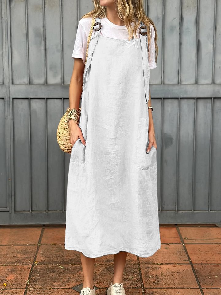 Comfy women's sleeveless dress with pockets and adjustable spaghetti straps.