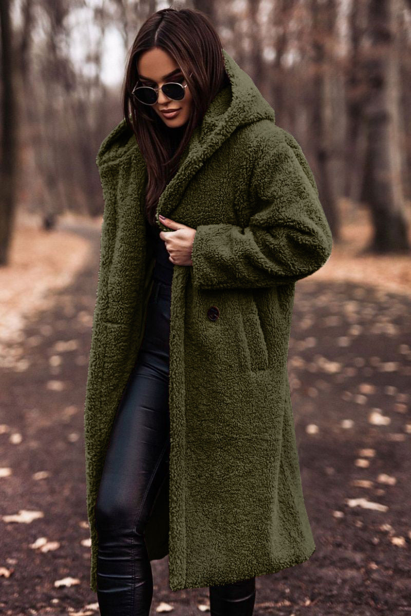 Soft plush hooded longline coat for women, ensuring cozy warmth during cold winter days.
