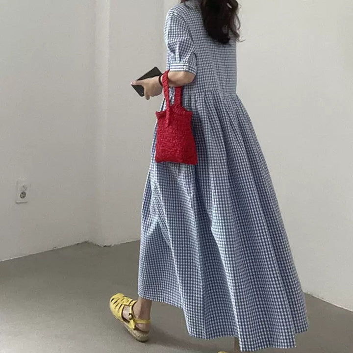 Versatile women's checkered A-line summer dress, providing a stylish and comfortable look for any day.