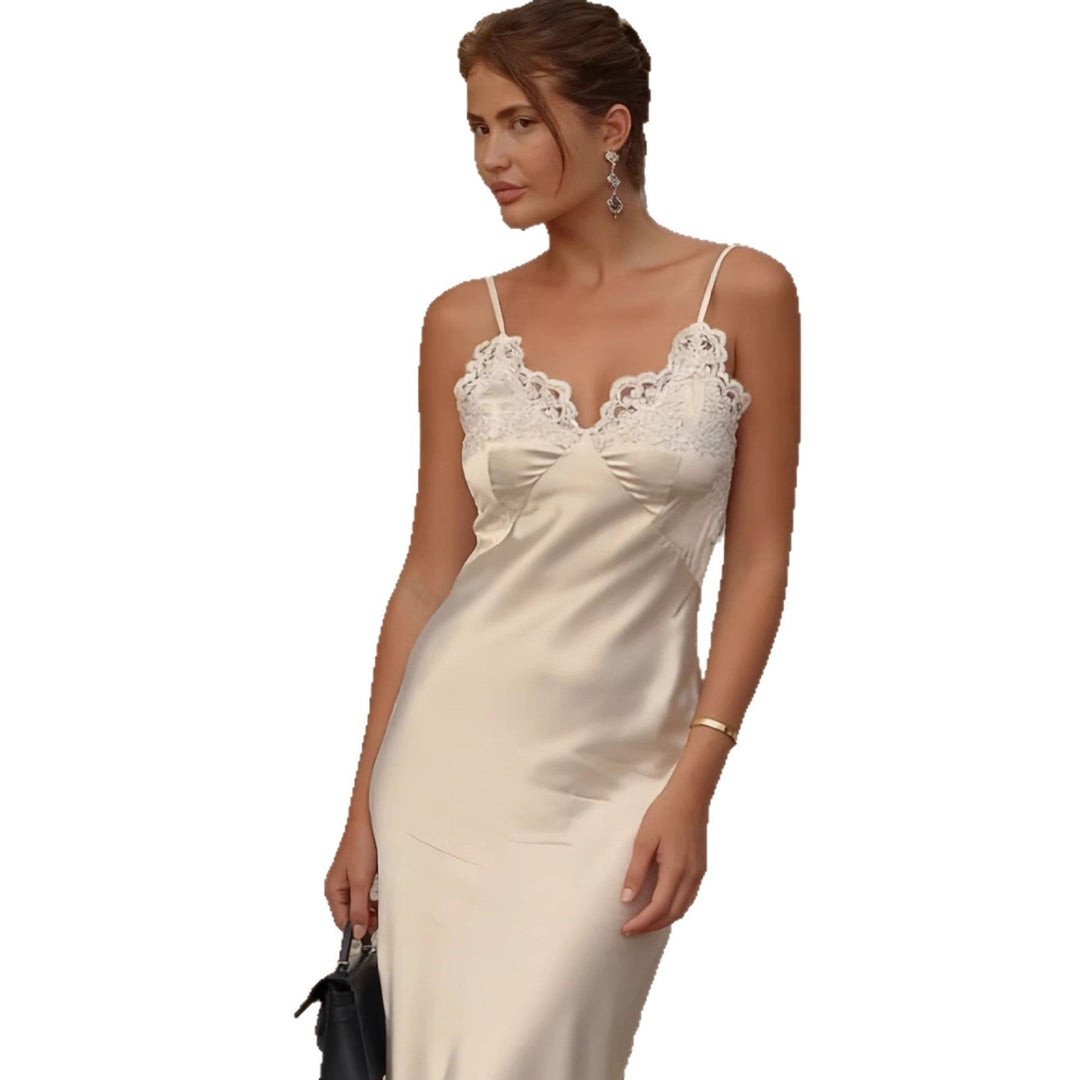 Chic cream lace trim maxi party dress with thin straps, a graceful & fashionable ladies' evening gown.