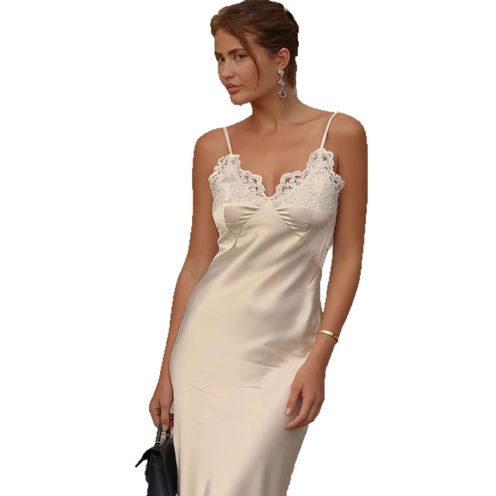 Chic cream lace trim maxi party dress with thin straps, a graceful & fashionable ladies' evening gown.