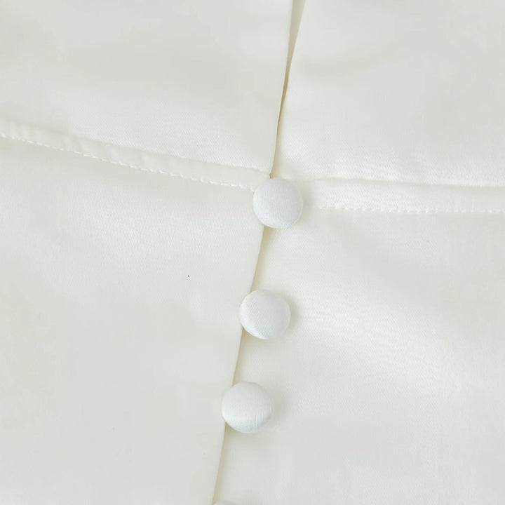 Sophisticated white tailored blazer for women, a versatile elegant jacket for formal events.