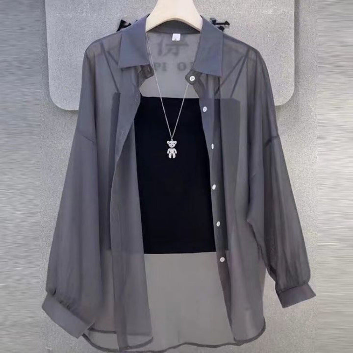 Women's sheer button-down layered tunic. Elegant long-sleeve blouse for versatile spring & summer fashion.
