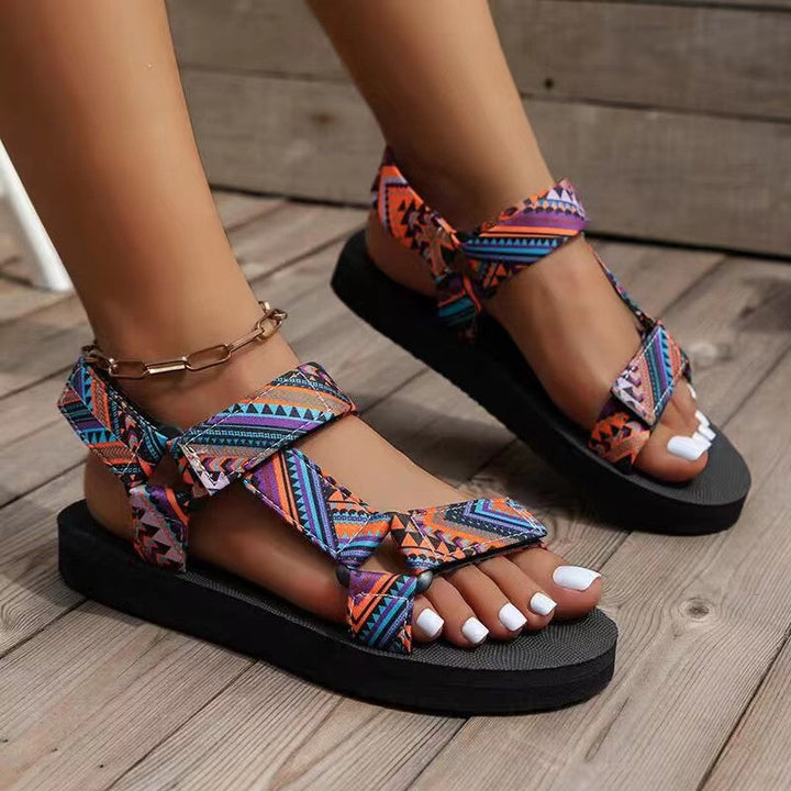 Comfortable women's summer sandals, t-strap design, vibrant colors, orthopedic support.