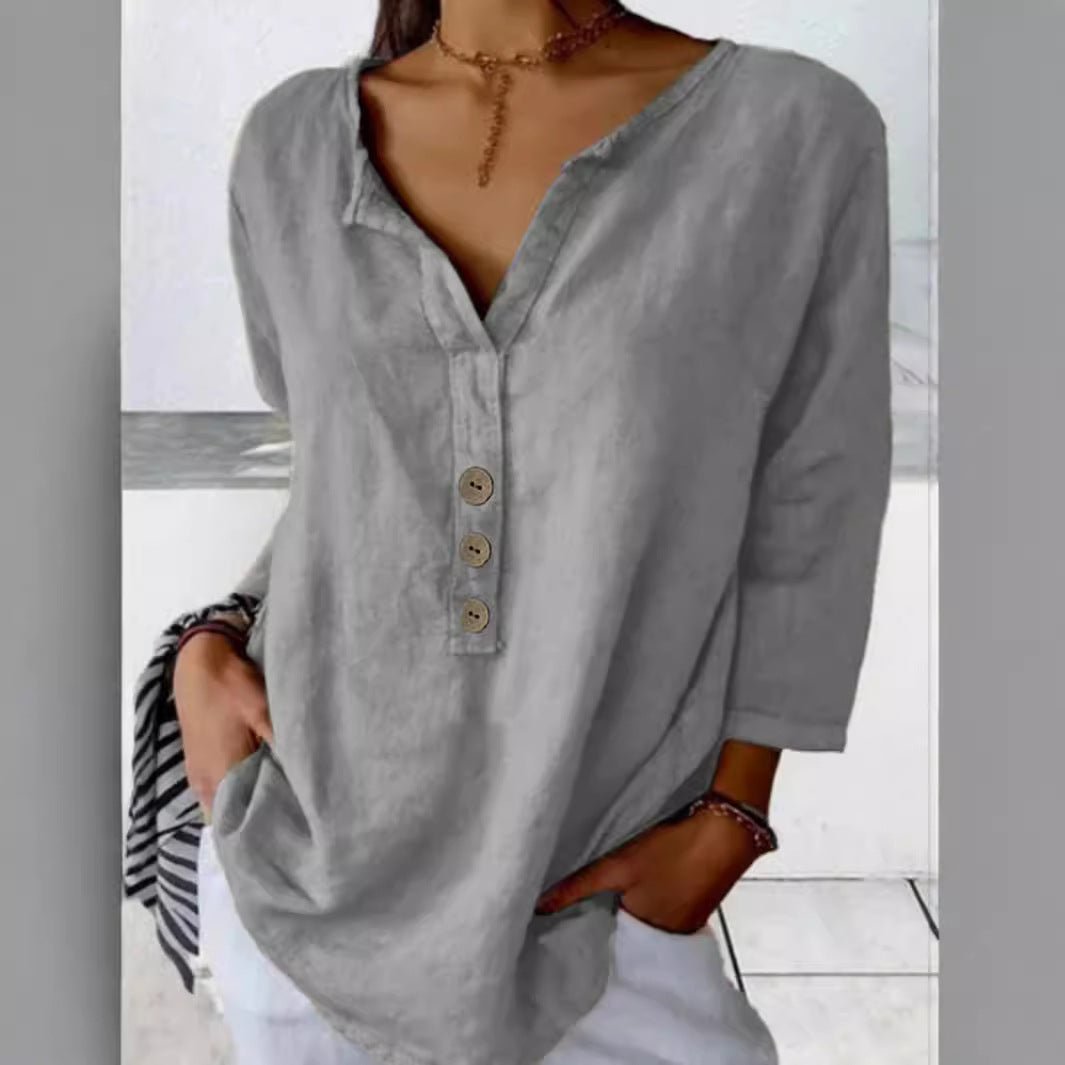 Stylish women's button-down blouse with v-neck & 3/4 sleeves. Versatile loose top for relaxed summer fashion.