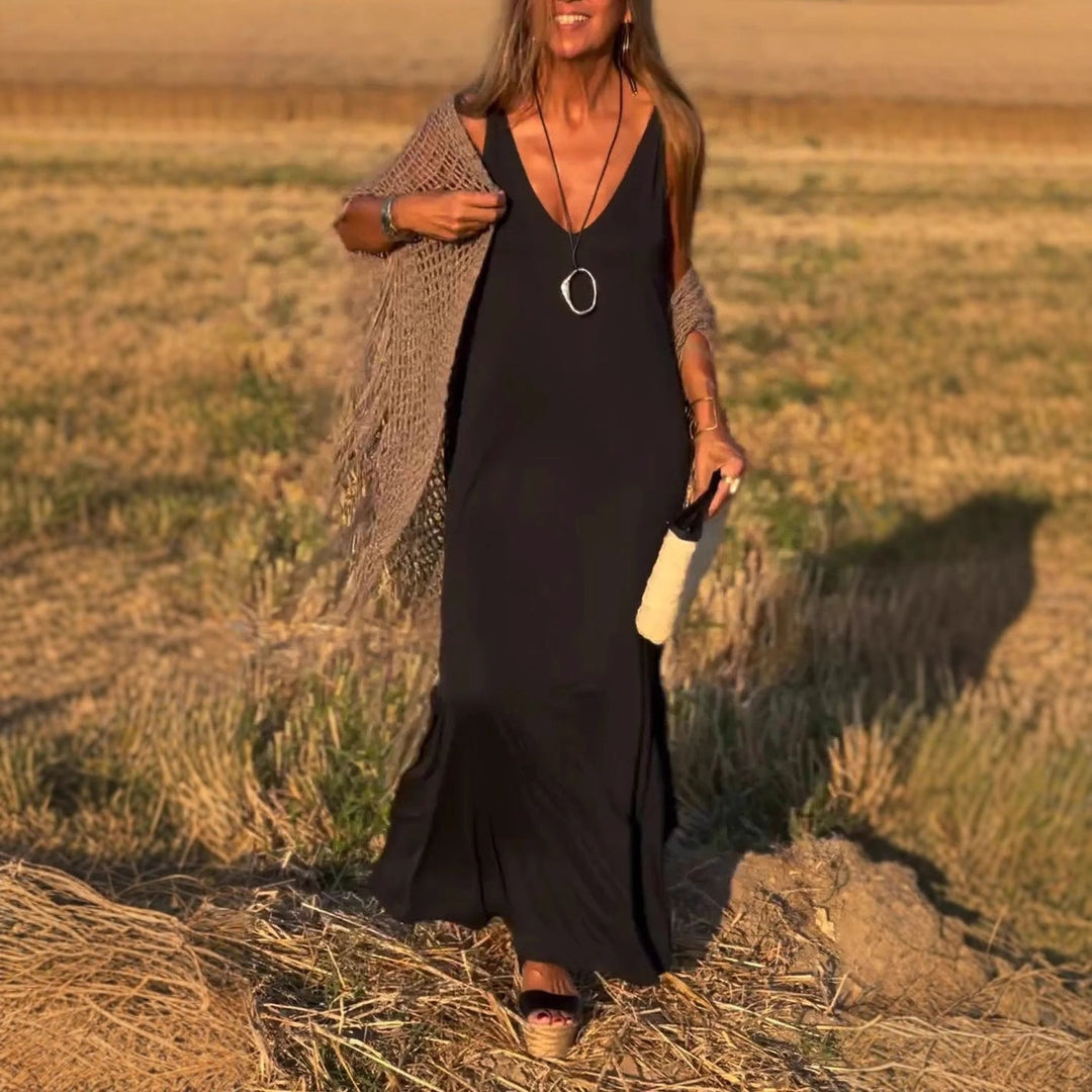 Chic women's elegant V-neck maxi dress, offering a flattering and comfortable fit for all events.