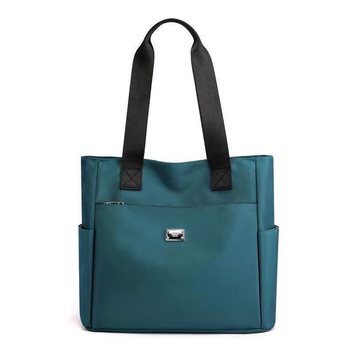 Stylish pink lightweight waterproof shoulder bag for women. Ideal for daily, travel, and everyday carry.