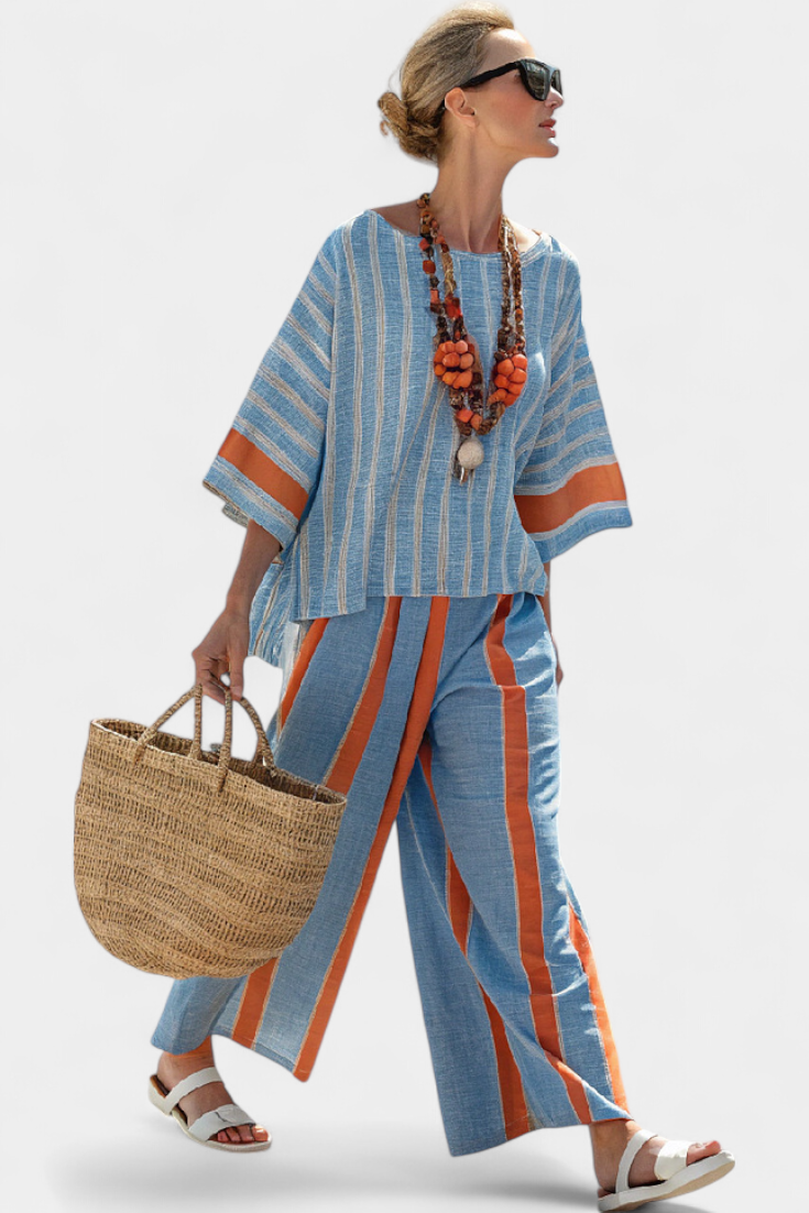 Sophisticated women's terracotta striped top and trousers set. Stylish and comfortable two-piece for summer and casual wear.