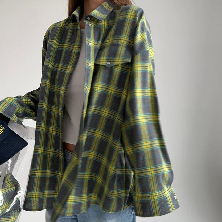 Trendy women's oversized plaid top, button-up shirt blouse, long sleeve, adding style to any casual look.