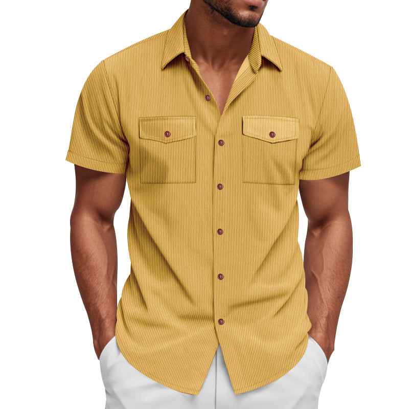 Relaxed fit men's striped short sleeve shirt, featuring two chest pockets. Ideal for comfortable everyday fashion.