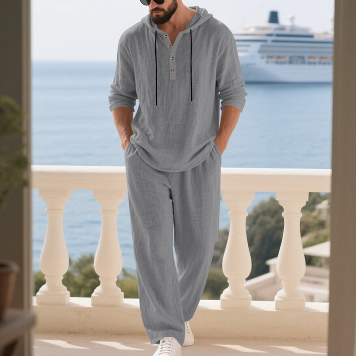 Front view of a men's relaxed fit hoodie set with practical kangaroo pockets.
