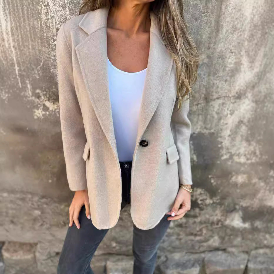 Stylish women's relaxed fit blazer, a chic top for elegant smart casual fashion & office wear.