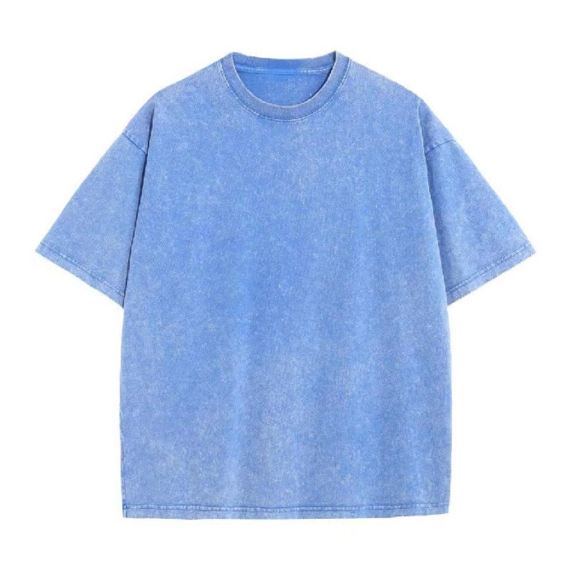 Fashionable women's oversized crewneck t-shirt with a unique vintage wash, great for summer style.