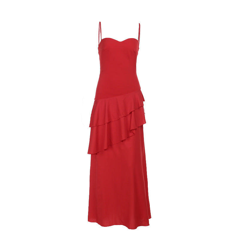 Stylish women's maxi dress with romantic ruffles and spaghetti straps, perfect for formal and elegant occasions.