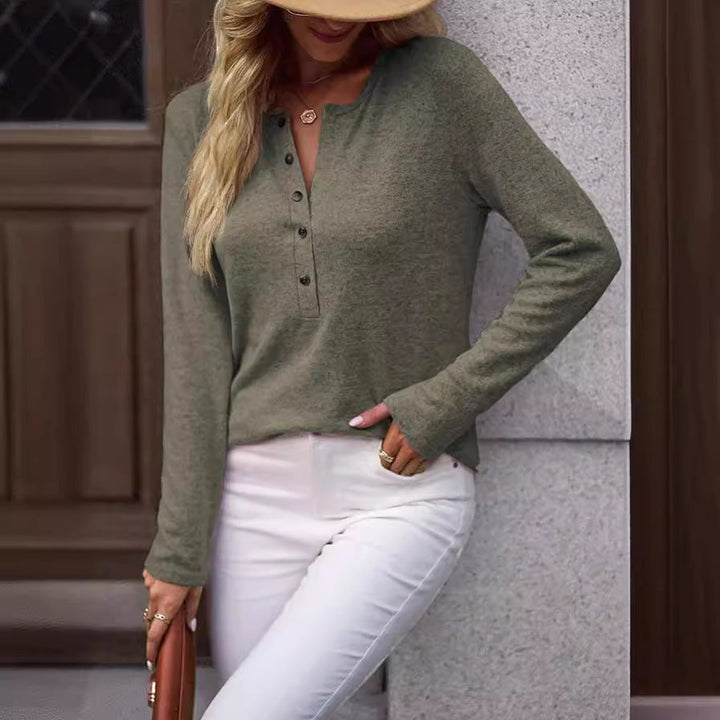 Comfortable women's long sleeve top with unique button detail, ideal for everyday casual style.