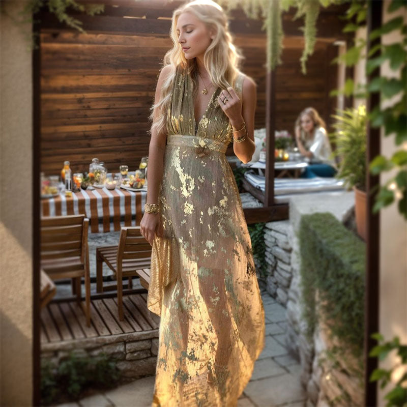 Elegant women's V-neck maxi dress with luxurious gold pattern, perfect for evening or party.