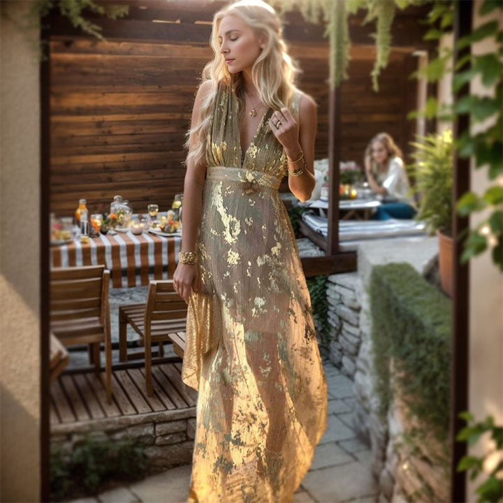 Elegant women's V-neck maxi dress with luxurious gold pattern, perfect for evening or party.