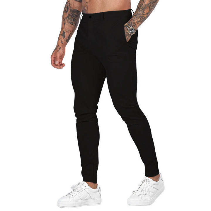 Men's slim-fit stretch chinos laid flat, showcasing their clean design & versatile casual/formal style.