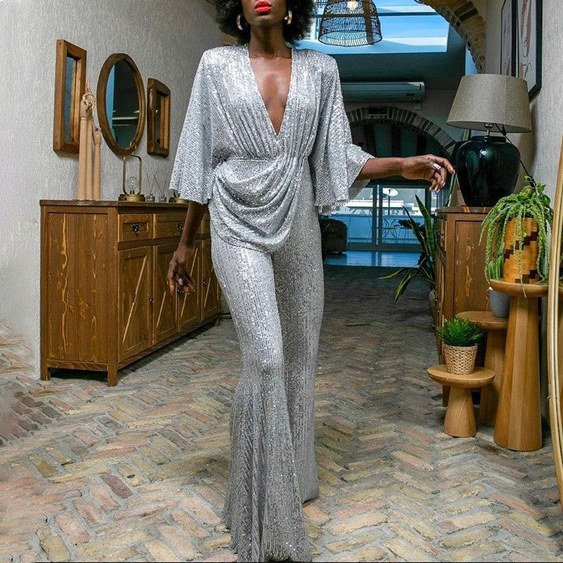 Chic women's sequin wide-leg jumpsuit with a flattering V-neck, great for any festive occasion.