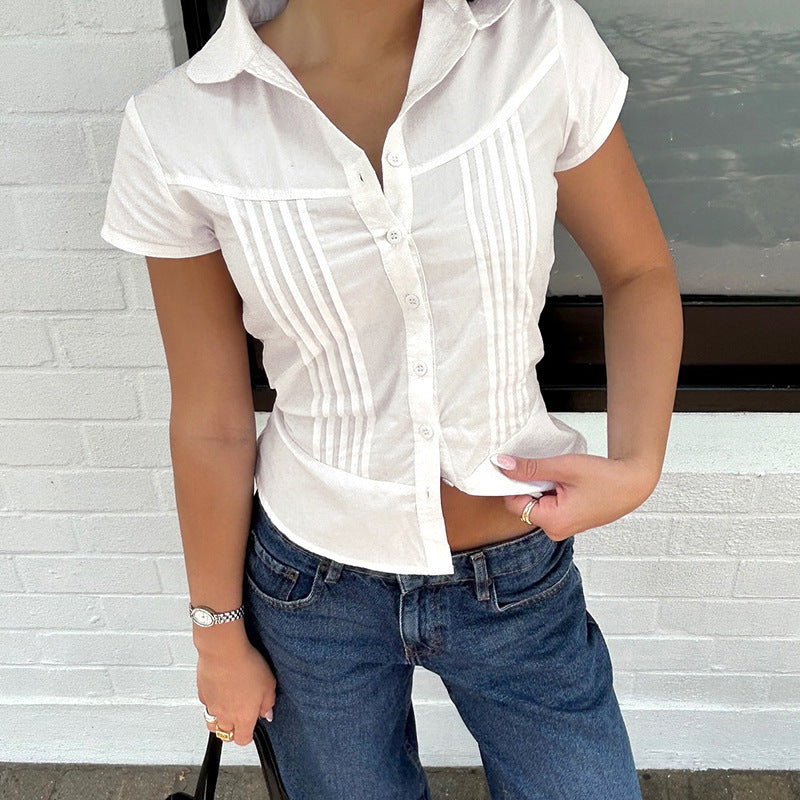 Stylish women's short sleeve blouse featuring intricate button detailing, great for professional or daily wear.