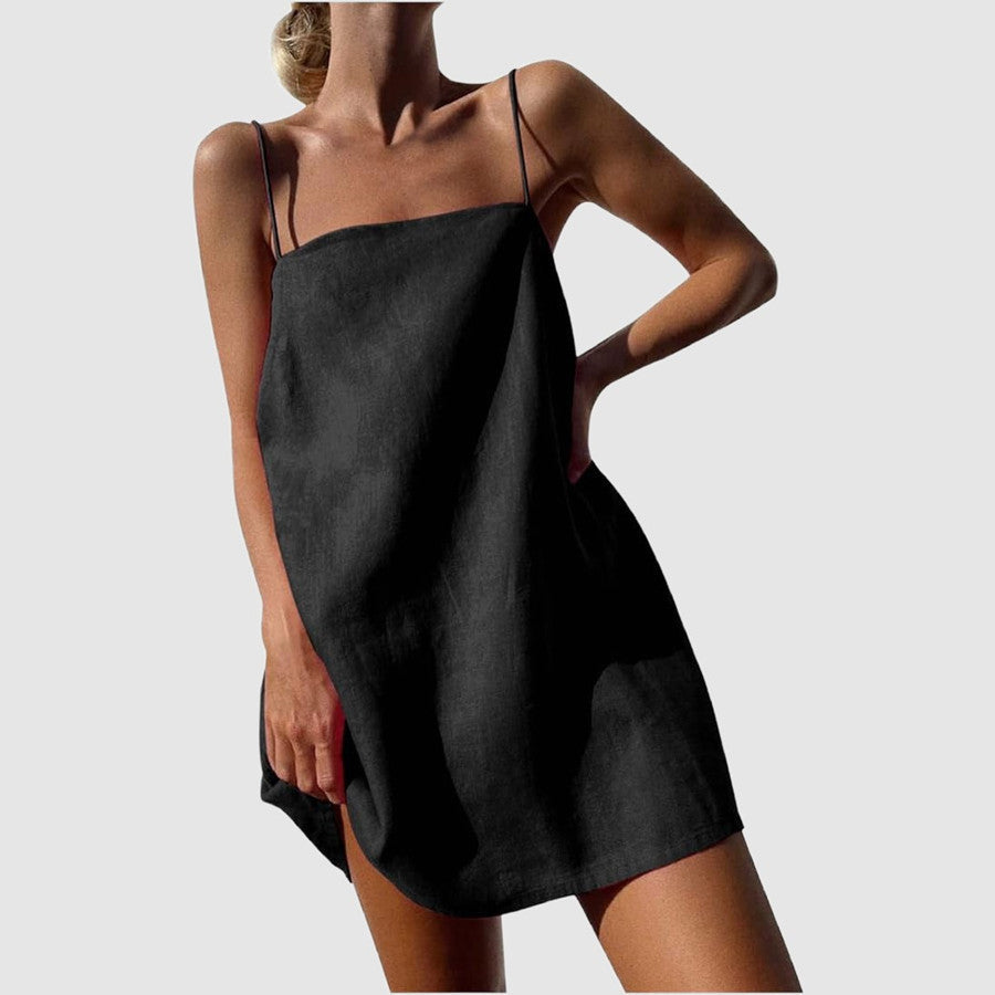 Casual A-line sundress for women with spaghetti straps & convenient side pockets, a breezy summer essential.