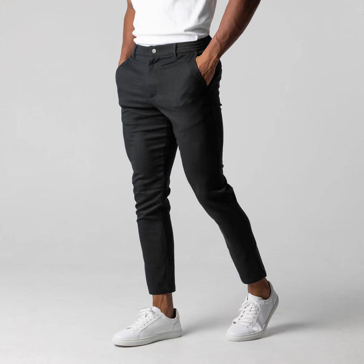 Men's slim fit chino pants, elastic waist, casual trousers, versatile modern men's fashion everyday bottoms.