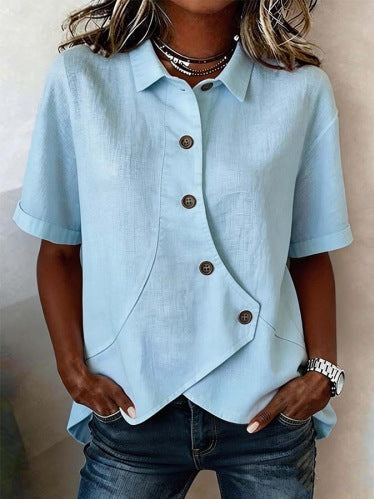 Lightweight women's blouse with a fashionable wavy print, elegant button detail, perfect for versatile styling.
