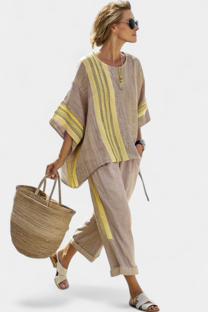 Versatile women's striped two-piece set; chic top and pants for a stylish, coordinated summer outfit.