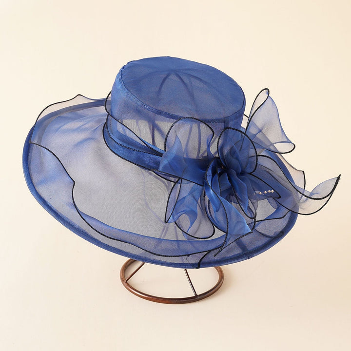 Versatile elegant mesh sun hat with a romantic bow for women, suitable for beach, garden & travel.